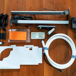 <em>Everything that comes in Govee’s DreamView kit, including the lights, camera, cables, adhesive clips, guides, and orange calibration foam.</em>