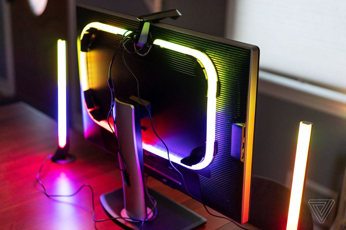 The DreamView G1 Pro mounted to the back or a monitor and flanked by its two vertical light bars.